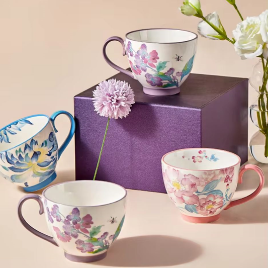 Watercolor Style Flowers On Ceramic Mugs With Pink Blue And Purple Colors Gift Worthy Ceramics For Garden Lovers